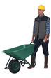 Man with empty wheelbarrow