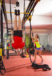 Crossfit fitness dip ring man workout upside down at gym