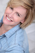 Portrait of woman with blue shirt