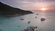 Yachts and boats in calm Andaman Sea during sunset, Thailand