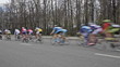 Group of cyclists in action during a cycling tour
