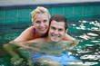Photo: Happy honeymoon in a swimming pool Happy honeymoon in a swimming pool