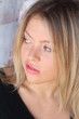 Beautiful blond portrait, near a graffiti wall