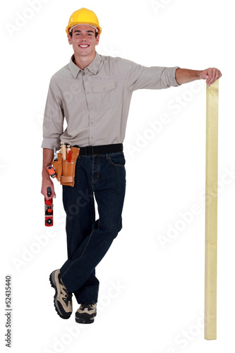 Photo: Man with wood plane Man with wood plane