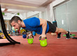 Crossfit fitness man push ups Kettlebells pushup exercise