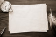 watch and ink pen at envelope