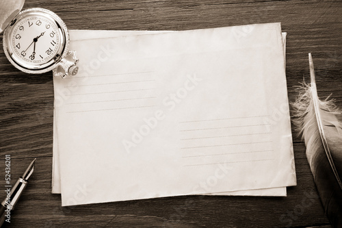 Photo: watch and ink pen at envelope watch and ink pen at envelope