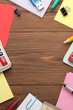 school supplies on wood