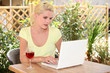 Photo: young woman relaxing in the backyard young woman relaxing in the backyard