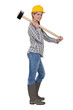 Photo: Woman with a sledgehammer Woman with a sledgehammer