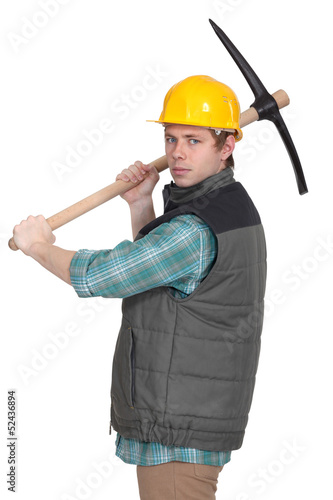 Photo: Angry tradesman with a pickaxe Angry tradesman with a pickaxe