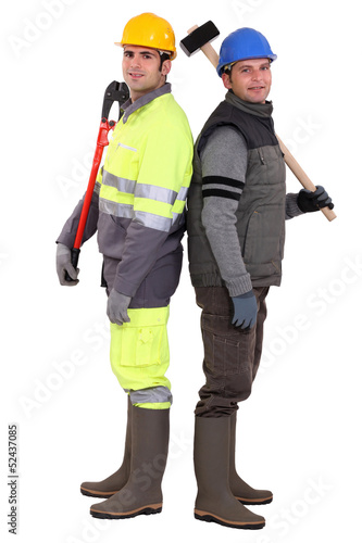Photo: two craftsmen posing together two craftsmen posing together