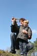 Father and son with a toy plane