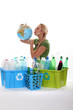 Woman holding globe recycling bottles