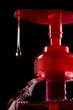 Liquid soap drop red bottle