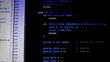 Dolly shot of Computer code on LCD monitor