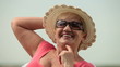 Face of happy senior woman outdoors