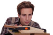 Foto: Carpenter aligning plank of wood Carpenter aligning plank of wood