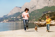 Happy playing family with dog