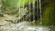 grotto under a waterfall