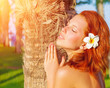 Pretty woman on tropical resort