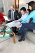 Foto: Family consulting with an architect Family consulting with an architect