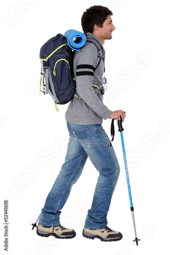 Photo: a man ready for backpacking in mountains a man ready for backpacking in mountains