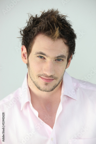 Photo: Portrait of young man Portrait of young man