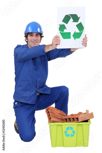 Photo: Manual worker encouraging people to recycle Manual worker encouraging people to recycle