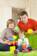 Happy family plays in home