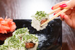 sushi with chopsticks