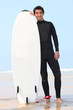 Photo: young surfer posing with board young surfer posing with board