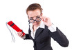Businesswoman with dynamite on white