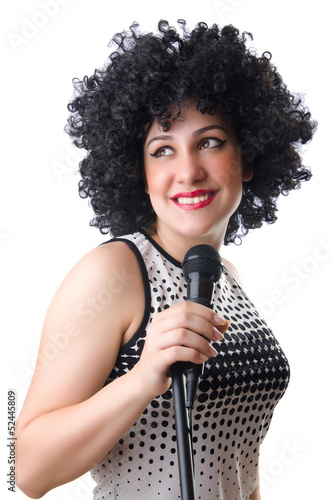 Photo: Pop star with mic on white Pop star with mic on white