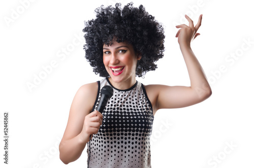 Photo: Pop star with mic on white Pop star with mic on white
