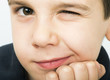 Little boy wink of an eye
