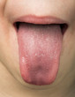 Human tongue protruding out