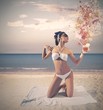 Photo: Vintage girl at the beach Vintage girl at the beach