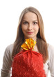 young woman with gift sack, isolated on white