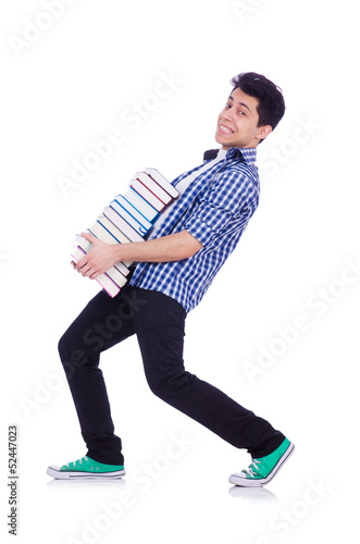 Photo: Student with lots of books on white Student with lots of books on white