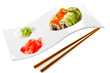 sushi on ceramic plate isolated on white
