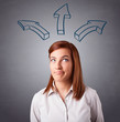 Pretty lady thinking with arrows overhead