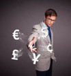 Attractive man throwing currency icons