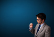 Young man smoking cigarette with copy space