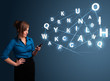 Young woman typing on smartphone with high tech 3d letters commi
