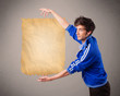 Young man presenting old paper copy space