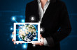 Woman presenting 3d earth globe in modern tablet