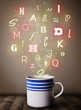 Coffee cup with colorful letters