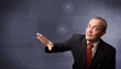 Photo: Elegant businessman touching copy space Elegant businessman touching copy space