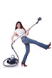 Young woman with vacuum cleaner on white